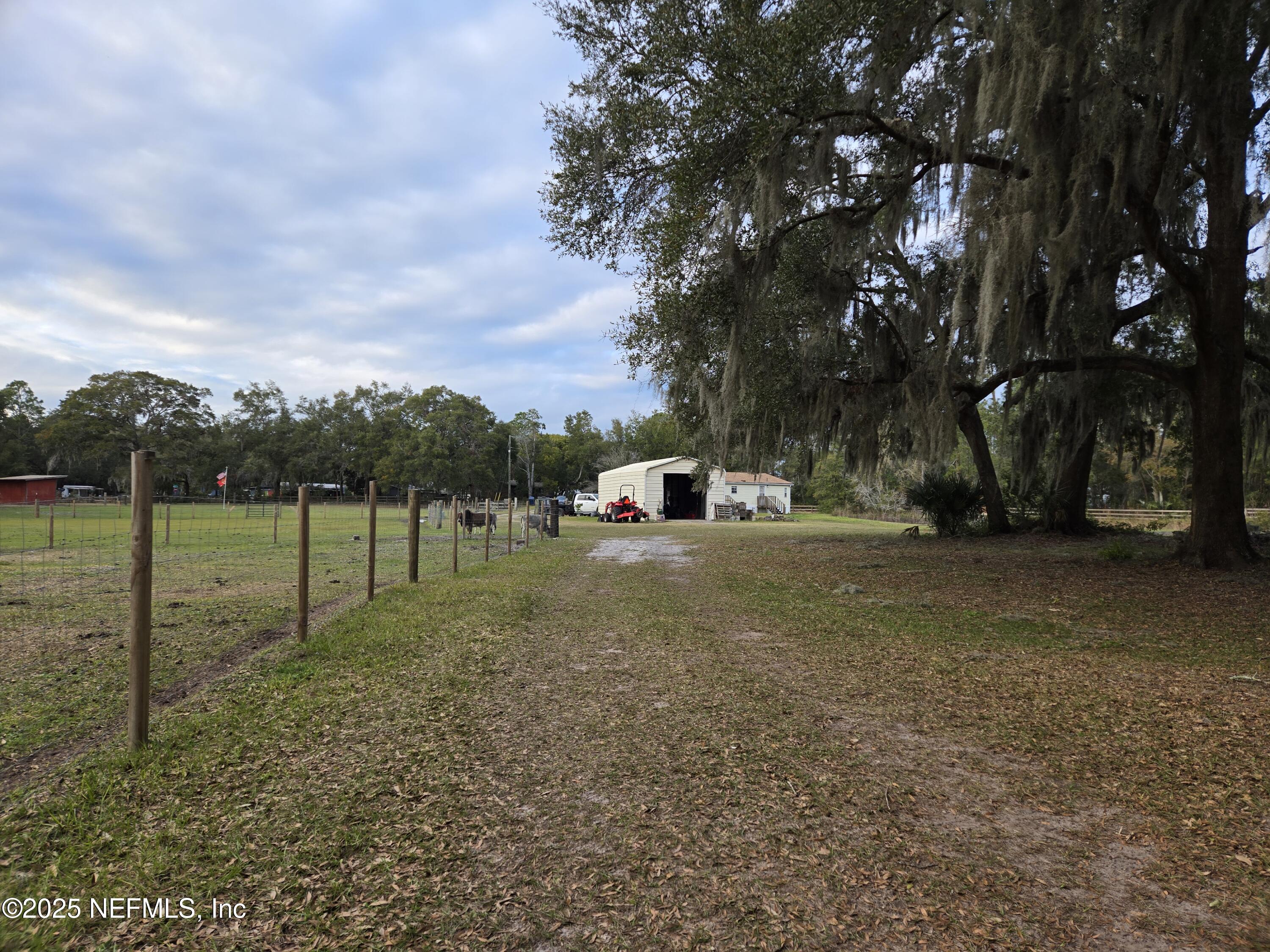 85050 Myrtice Road Yulee, FL 32097 - Photo 72 of 87 a view of backyard with green space