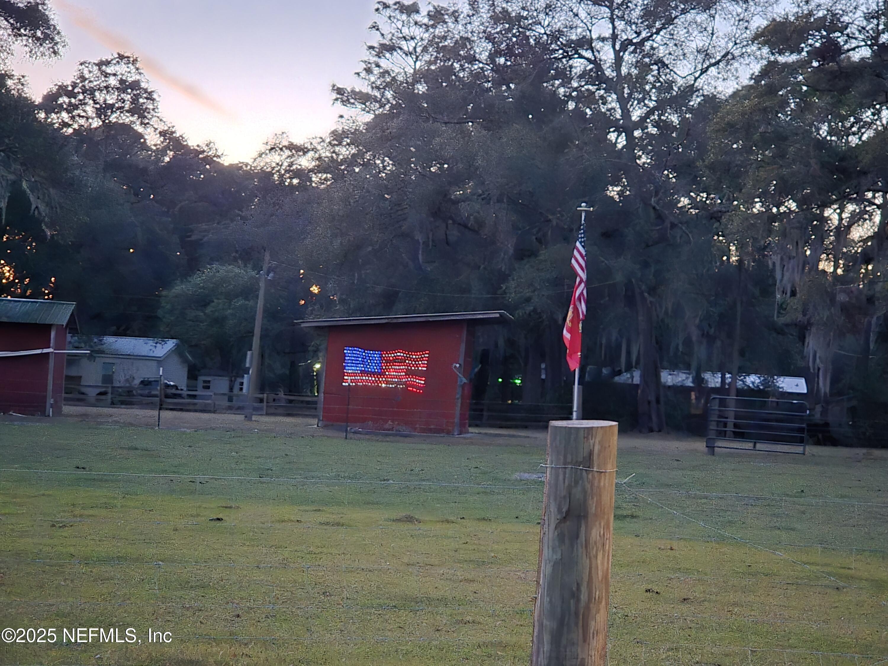85050 Myrtice Road Yulee, FL 32097 - Photo 8 of 87 a sign that is sitting on a brick wall