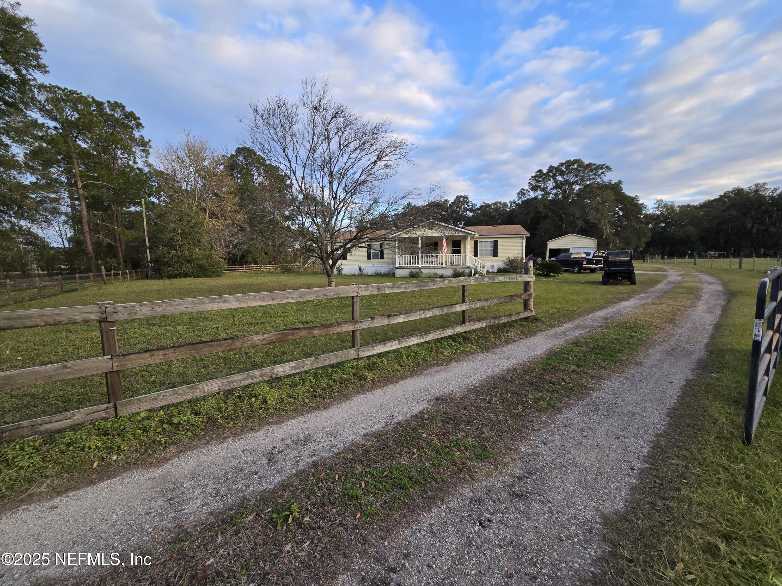 85050 Myrtice Road Yulee, FL 32097 - Photo 83 of 87 a view of a yard in front of a house