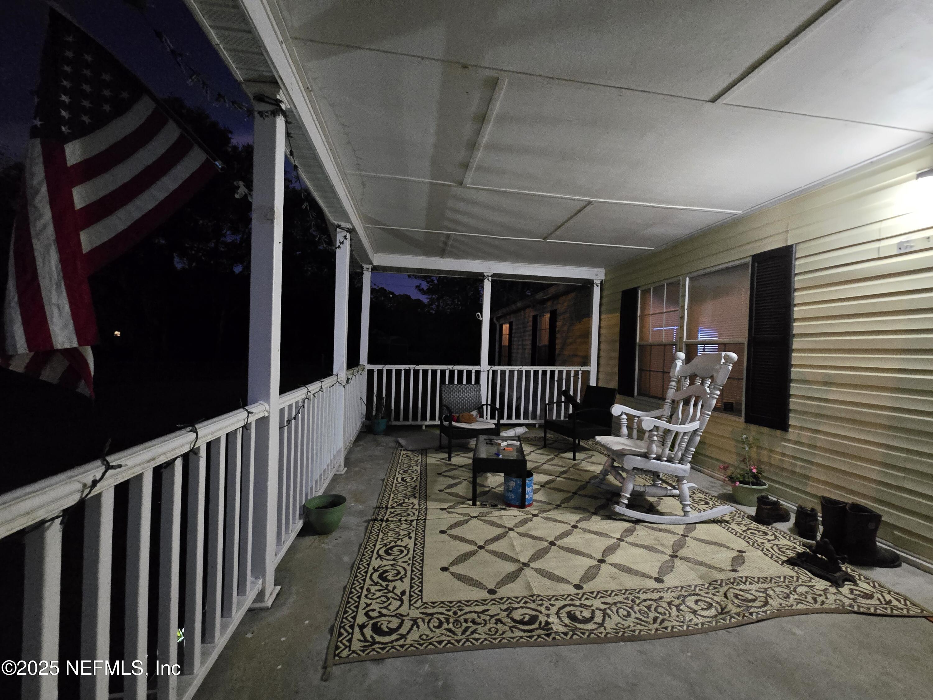 85050 Myrtice Road Yulee, FL 32097 - Photo 10 of 87 a view of a porch with furniture