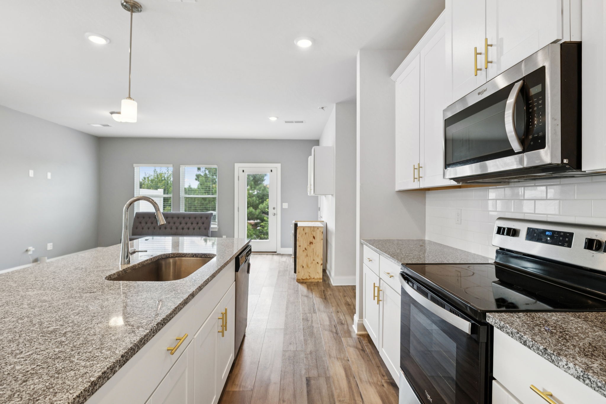 862 Longleaf Lane Columbia, TN 38401 - Photo 5 of 35 a kitchen with a sink a stove and cabinets