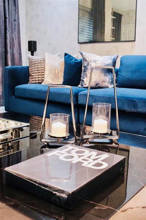 711 North Rome Avenue Tampa, FL 33606 - Photo 4 of 17 a view of kitchen with stainless steel appliances table chairs and flat screen tv