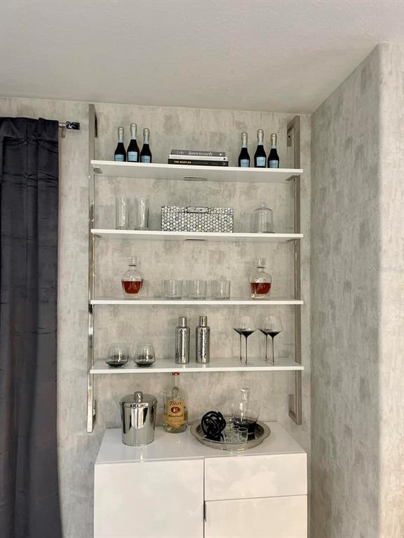 711 North Rome Avenue Tampa, FL 33606 - Photo 8 of 17 a shelf with cup and plates