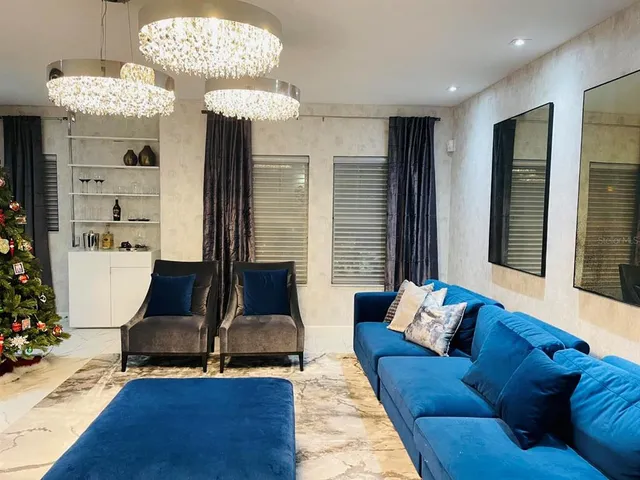 a kitchen with a stove and a refrigerator