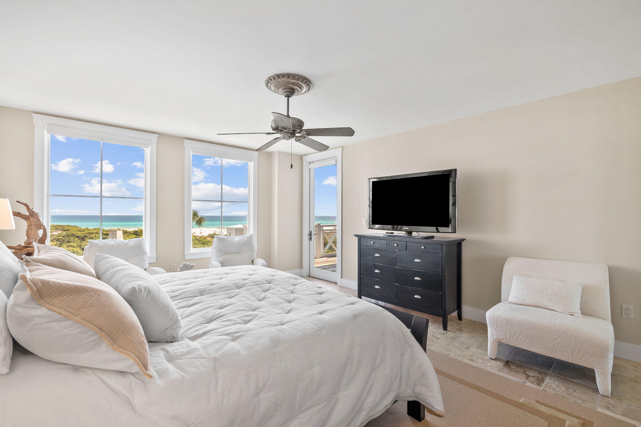337 Bridge Lane, Unit 314B Inlet Beach, FL 32461 - Photo 11 of 33 a bedroom with a bed and a flat screen tv