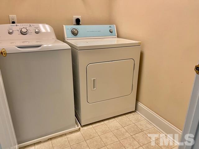 11239 11239th Raleigh, NC 27617 - Photo 17 of 26 a utility room with dryer and washer