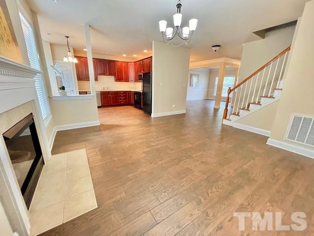 11239 11239th Raleigh, NC 27617 - Photo 7 of 26 a view of a livingroom with a fireplace