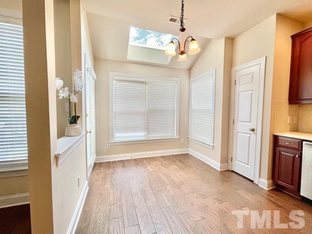 11239 11239th Raleigh, NC 27617 - Photo 10 of 26 a view of a bathroom with a sink and a mirror