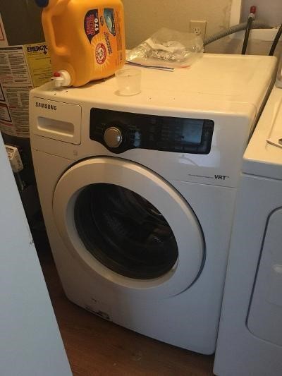 5221 Darling Street Houston, TX 77007 - Photo 18 of 22 a utility room with dryer and washer