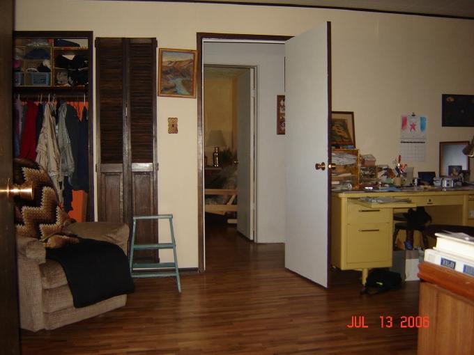 1291 North Track Road Wapato, WA 98951 - Photo 5 of 18 a view of walk in closet with clothes and shoes