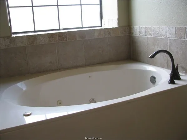 a close up of a bathtub