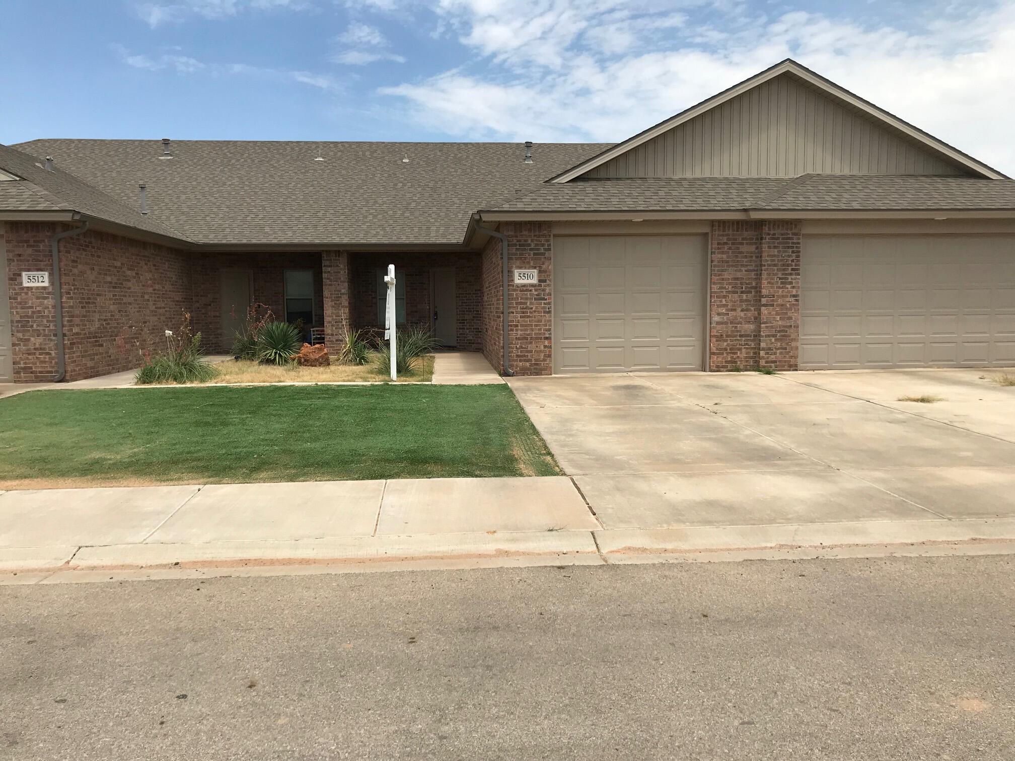 5510 Lehigh Street Lubbock, TX 79416 - Photo 1 of 32 a front view of a house with a yard and garage