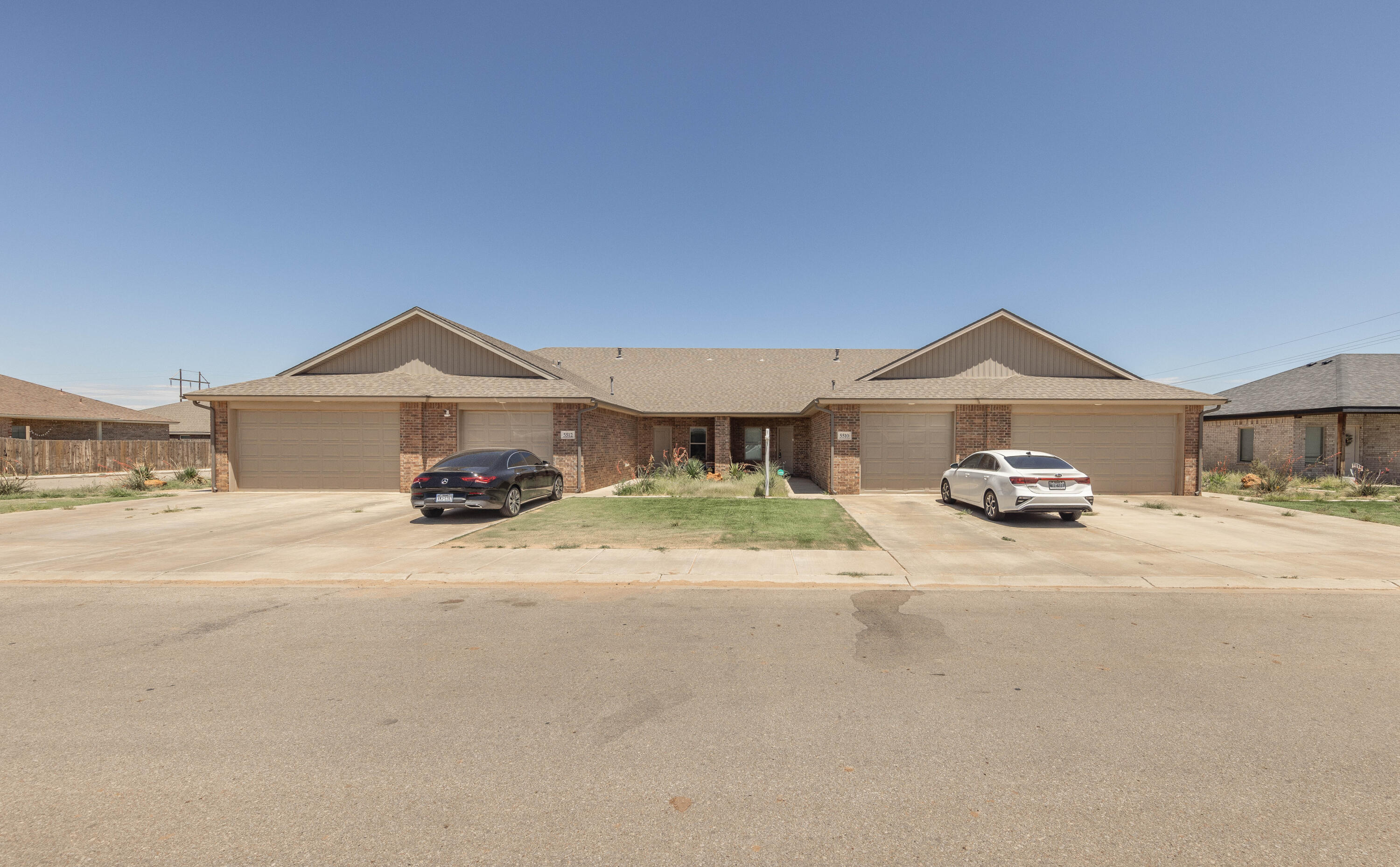 5510 Lehigh Street Lubbock, TX 79416 - Photo 32 of 32 a front view of a house with a yard and a garage