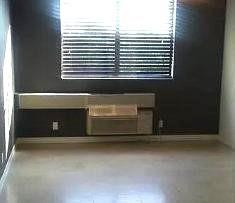 2501 Riverside Drive, Unit 417A Coral Springs, FL 33065 - Photo 6 of 8 a view of wooden floor and a fireplace