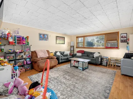a living room filled with furniture and a couch