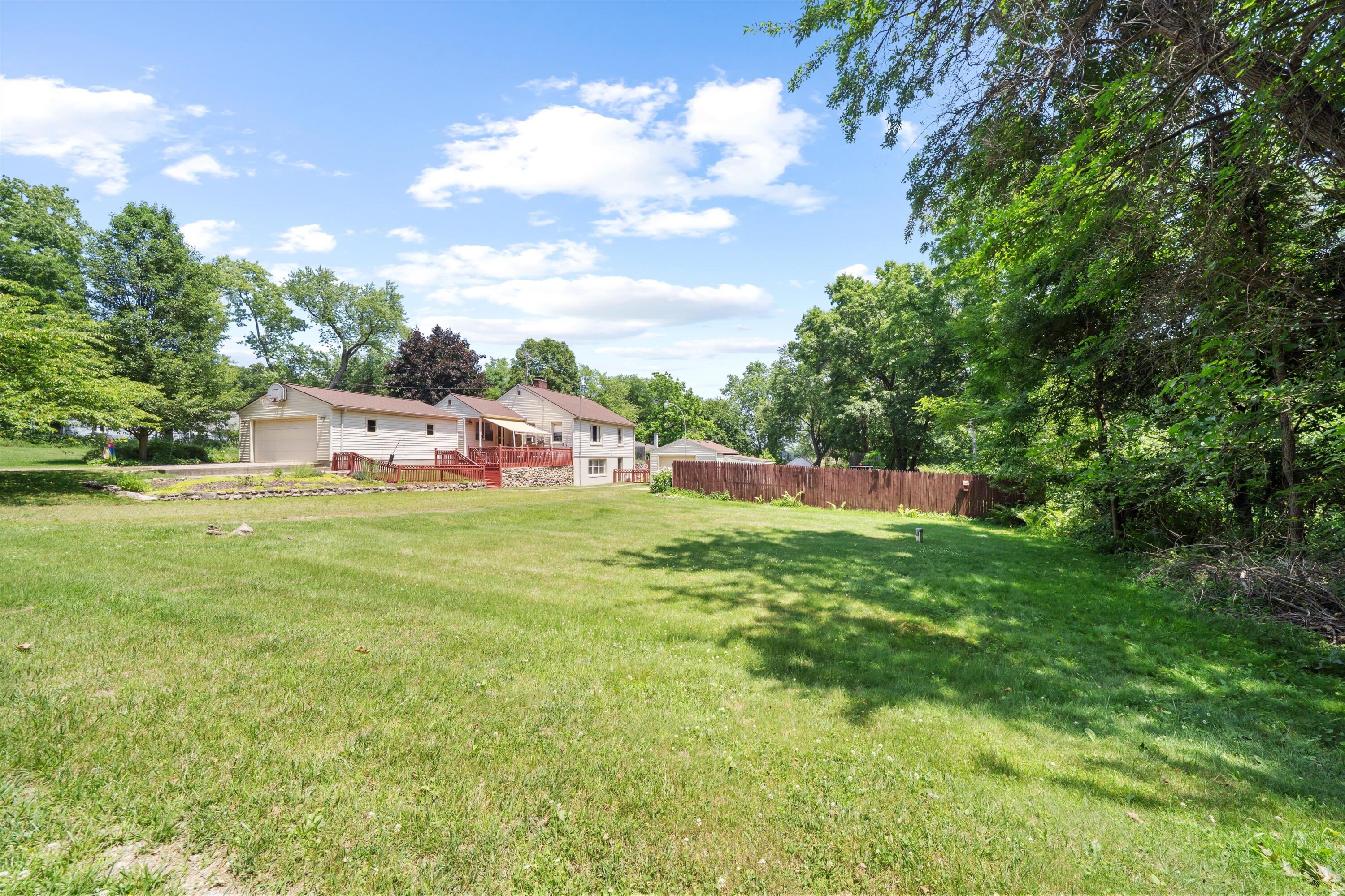 16009 Cavanaugh Lake Road Chelsea, MI 48118 - Photo 52 of 56 Side & Rear View