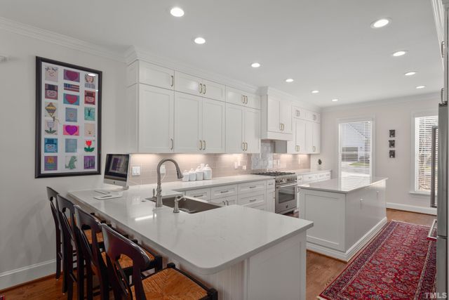 a view of kitchen with breakfast area