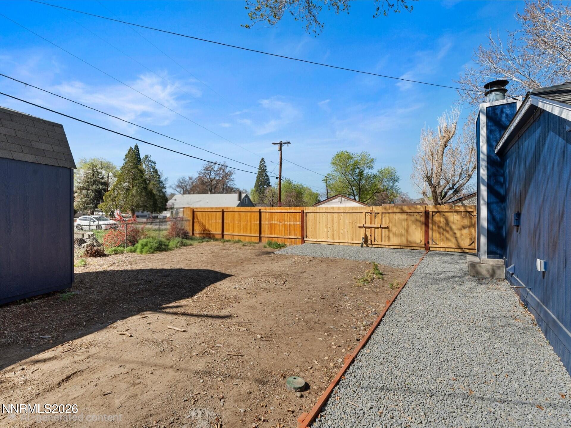 1030 4th Street Sparks, NV 89431 - Photo 17 of 26 a view of a backyard