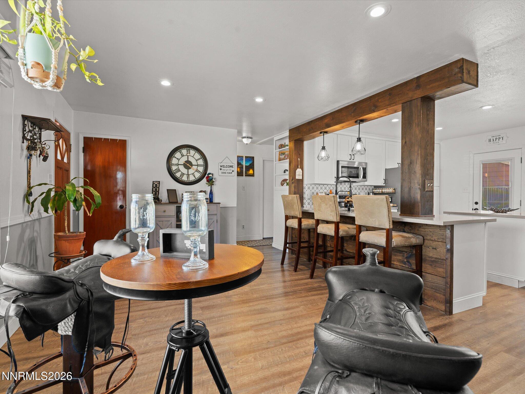 1030 4th Street Sparks, NV 89431 - Photo 18 of 26 a living room with furniture kitchen view and a table