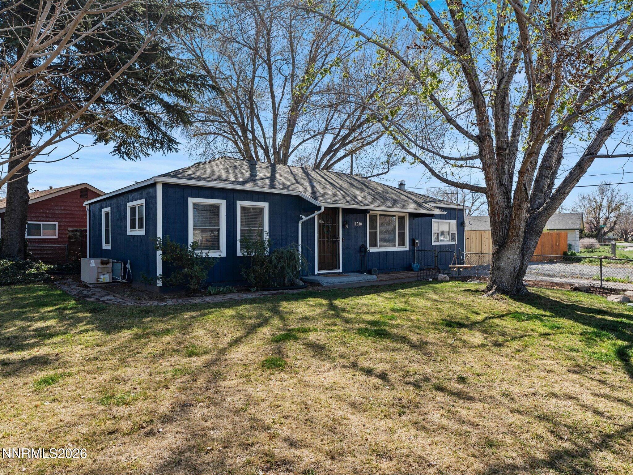 1030 4th Street Sparks, NV 89431 - Photo 25 of 26 a view of a yard in front of house
