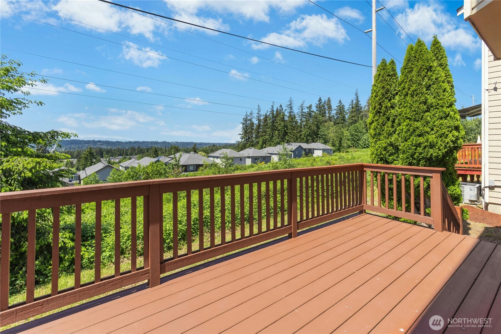 22624 43rd Drive Southeast Bothell, WA 98021 - Photo 29 of 36 a view of balcony with wooden floor and fence