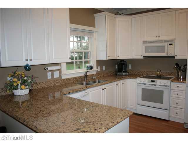 1583 Deer Run Court Oak Ridge, NC 27310 - Photo 9 of 16 Kitchen.