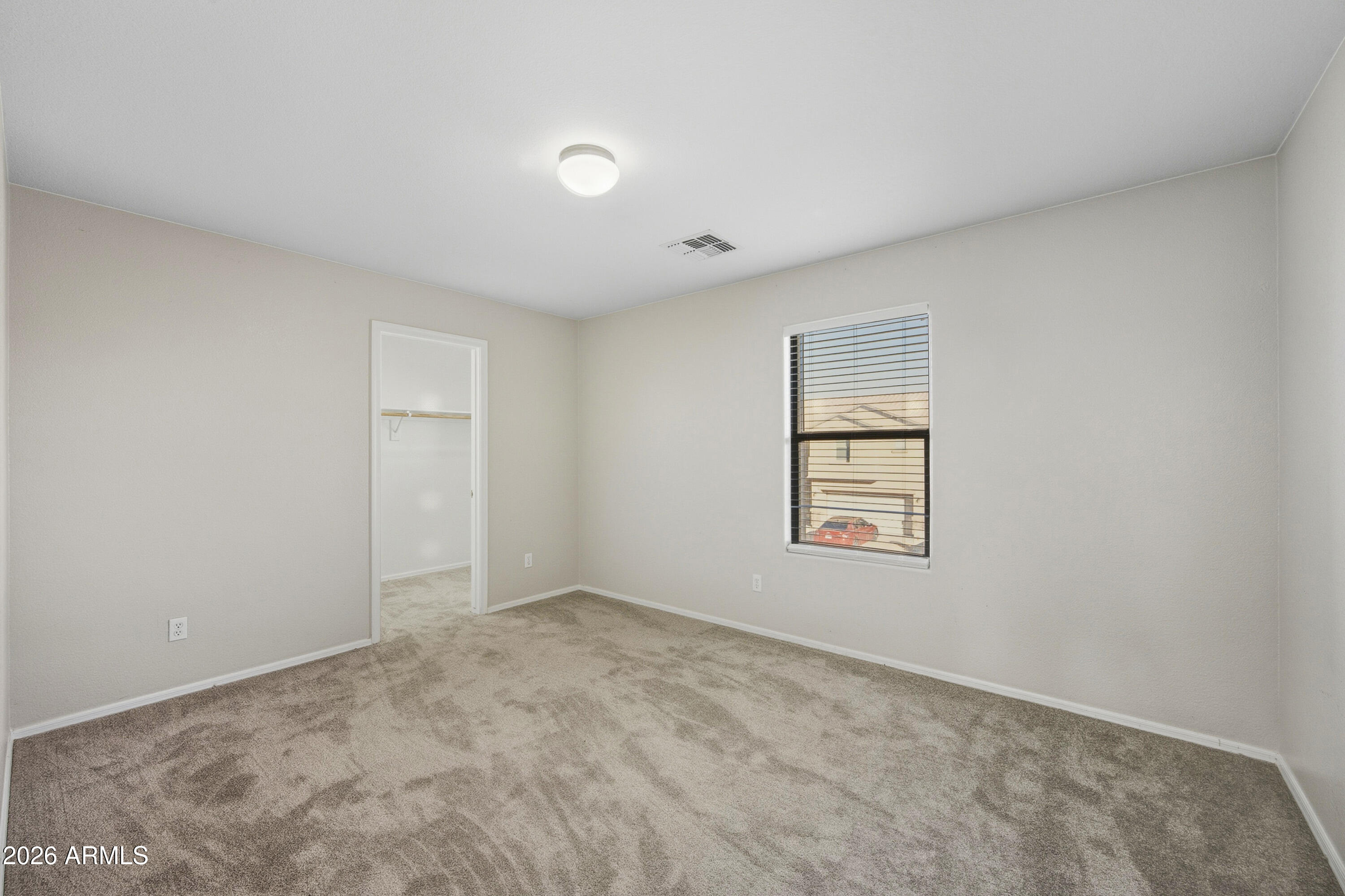 45651 West Barbara Lane Maricopa, AZ 85139 - Photo 19 of 32 an empty room with a window