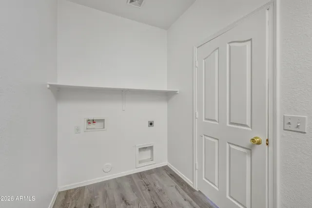 a bathroom with a sink vanity and a mirror
