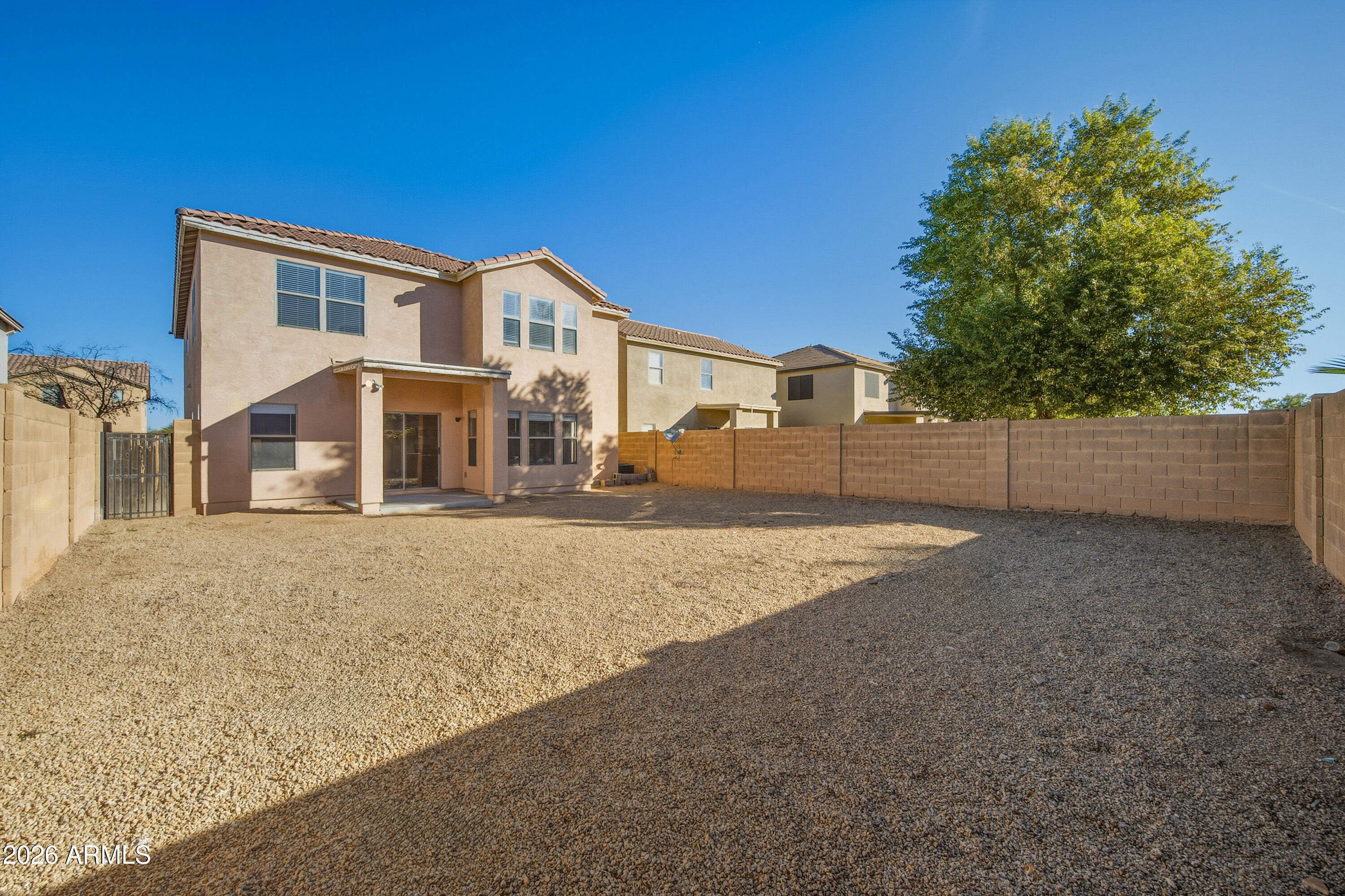 45651 West Barbara Lane Maricopa, AZ 85139 - Photo 27 of 32 a view of a house with a backyard