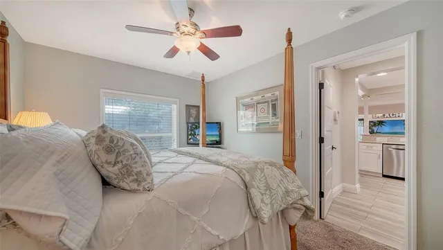 a bathroom with a double vanity sink toilet and shower