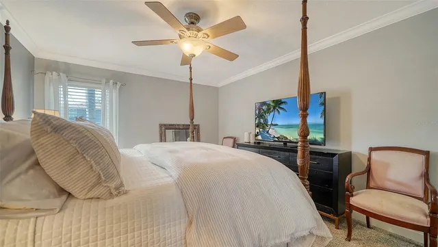 a bed room with a bed and a lamp