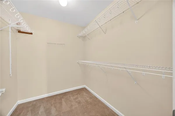 a view of small space with racks on the wall