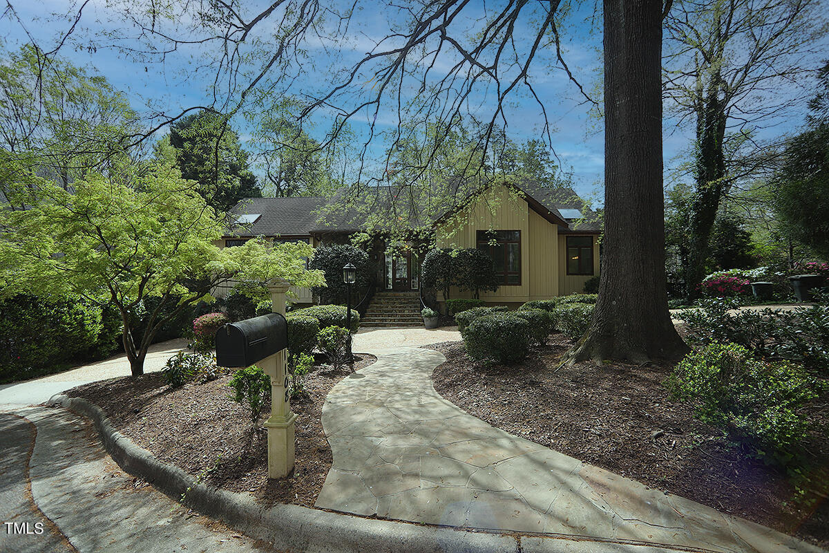 1108 Hymettus Court Raleigh, NC 27607 - Photo 1 of 48 a backyard of a house with outdoor seating