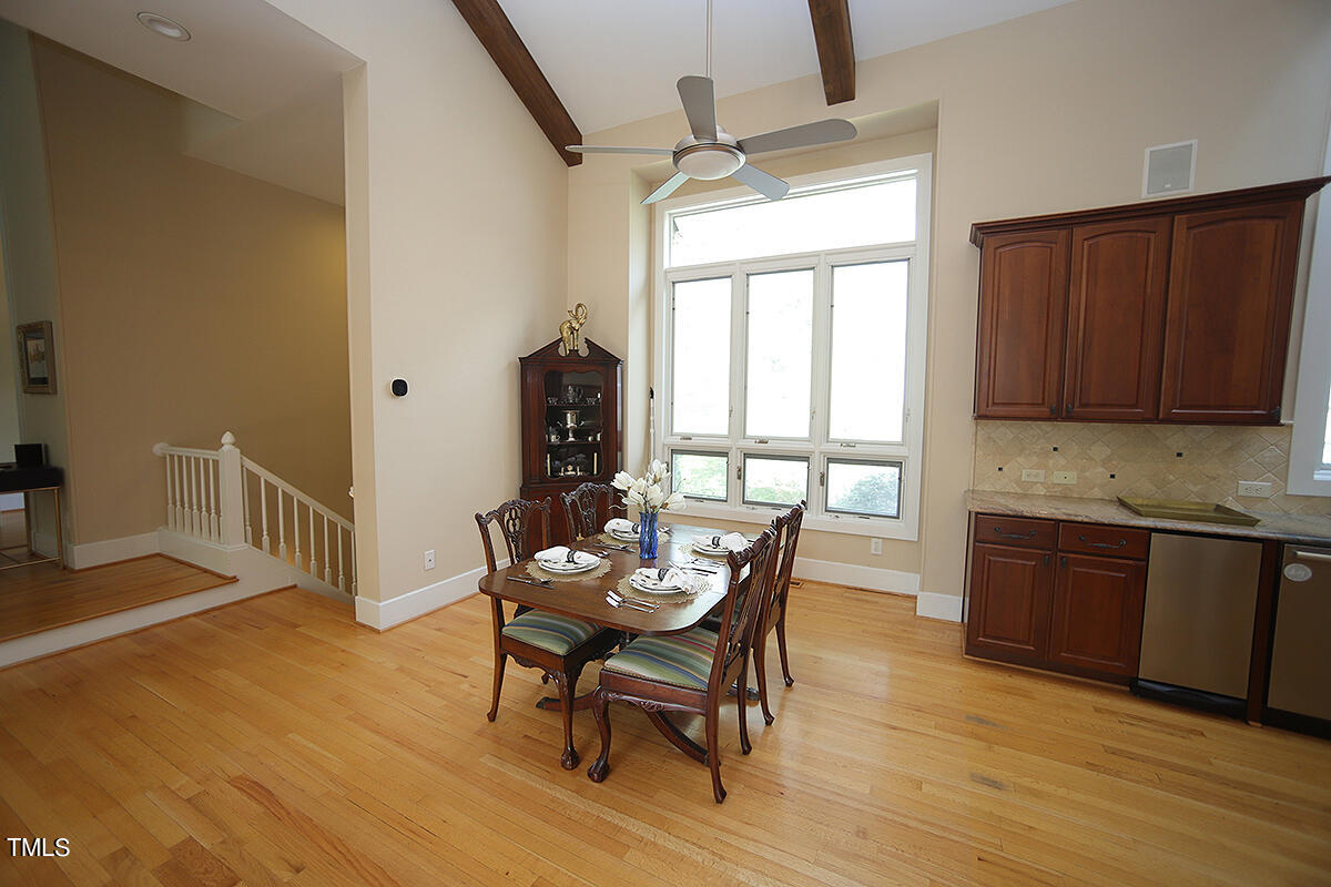 1108 Hymettus Court Raleigh, NC 27607 - Photo 11 of 48 a dining room with furniture and wooden floor