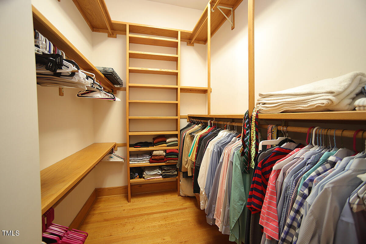 1108 Hymettus Court Raleigh, NC 27607 - Photo 24 of 48 a view of walk in closet with clothes and shoes