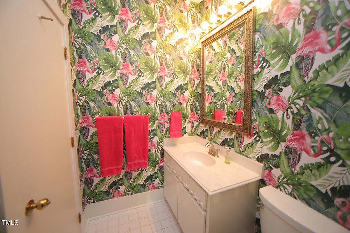 1108 Hymettus Court Raleigh, NC 27607 - Photo 27 of 48 a utility room with a sink and mirror