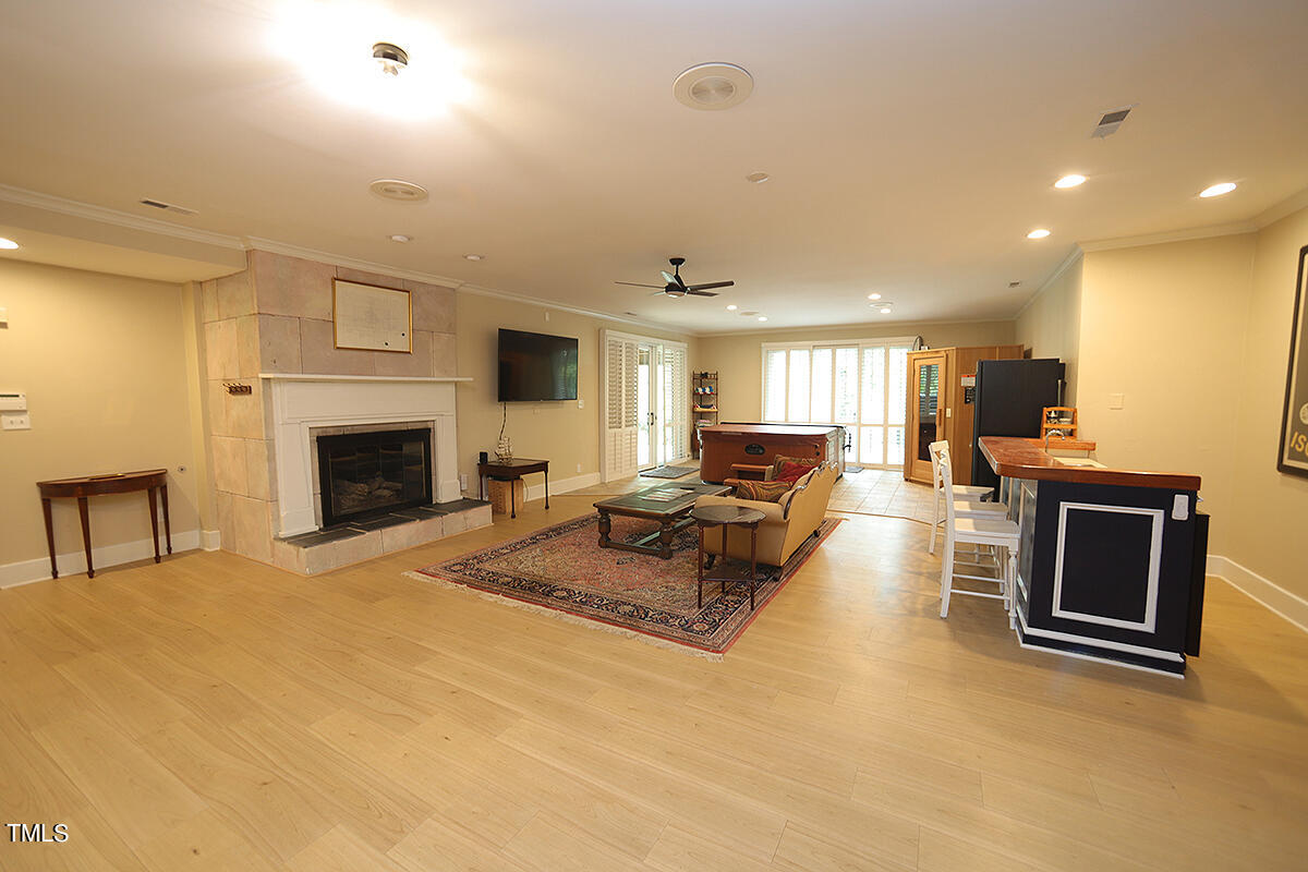 1108 Hymettus Court Raleigh, NC 27607 - Photo 29 of 48 a living room with furniture and a fireplace