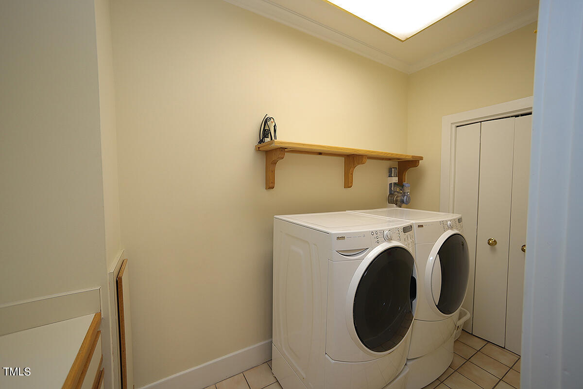 1108 Hymettus Court Raleigh, NC 27607 - Photo 39 of 48 a utility room with dryer and washer