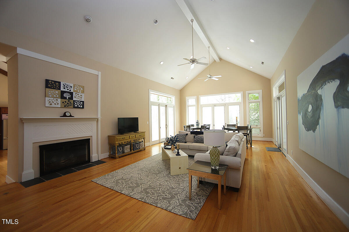 1108 Hymettus Court Raleigh, NC 27607 - Photo 4 of 48 a living room with furniture and a fireplace