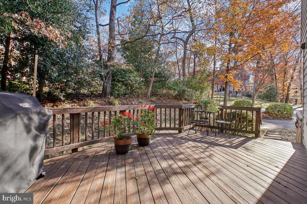 3105 Miller Heights Road Oakton, VA 22124 - Photo 17 of 60 a view of a chairs on a deck