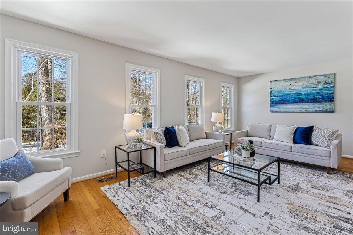 3105 Miller Heights Road Oakton, VA 22124 - Photo 21 of 60 a living room with furniture and a window