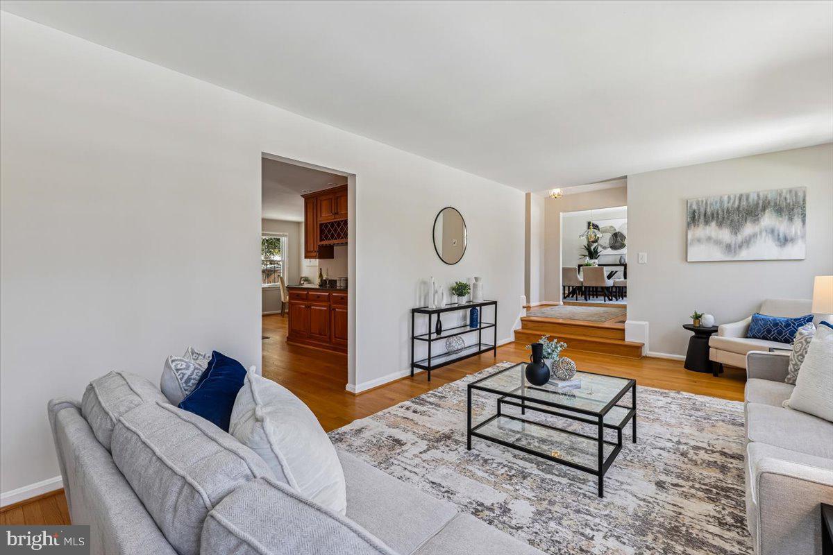3105 Miller Heights Road Oakton, VA 22124 - Photo 22 of 60 a living room with furniture and a wooden floor