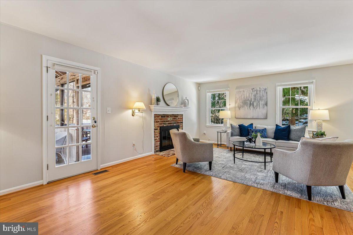 3105 Miller Heights Road Oakton, VA 22124 - Photo 22 of 60 Family room opens to screened porch.