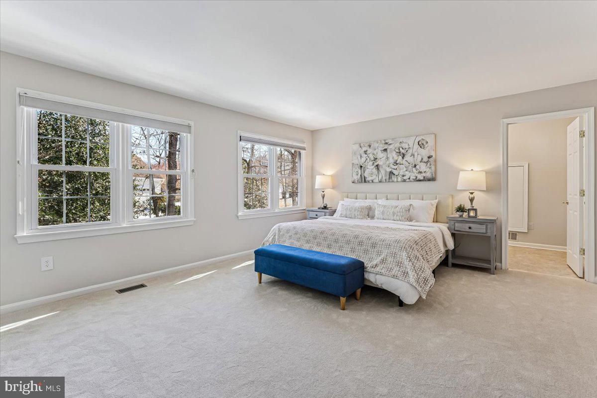 3105 Miller Heights Road Oakton, VA 22124 - Photo 29 of 60 Primary bedroom with a wall of windows.