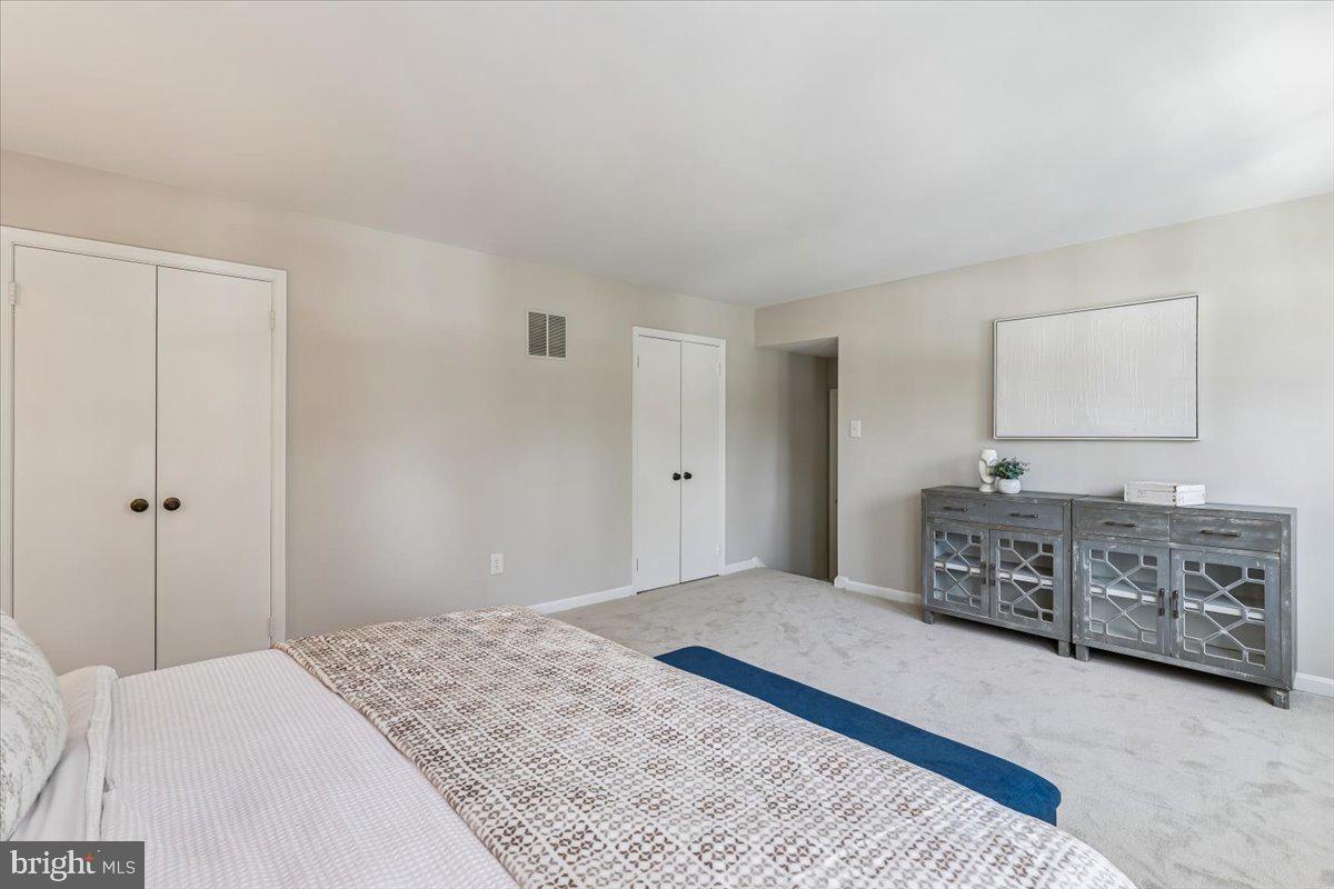 3105 Miller Heights Road Oakton, VA 22124 - Photo 33 of 60 a bedroom with a bed and a sink