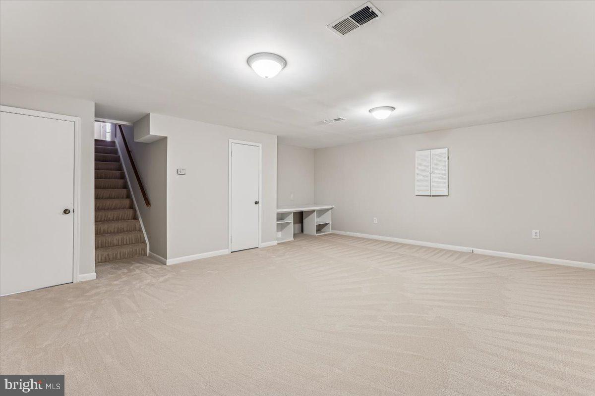 3105 Miller Heights Road Oakton, VA 22124 - Photo 45 of 60 Lower level rec room has new carpet.