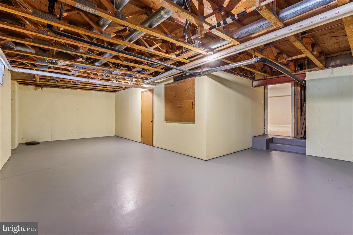 3105 Miller Heights Road Oakton, VA 22124 - Photo 48 of 60 a view of a room with wooden walls