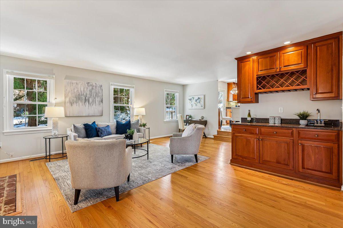 3105 Miller Heights Road Oakton, VA 22124 - Photo 10 of 60 a living room with furniture and a flat screen tv