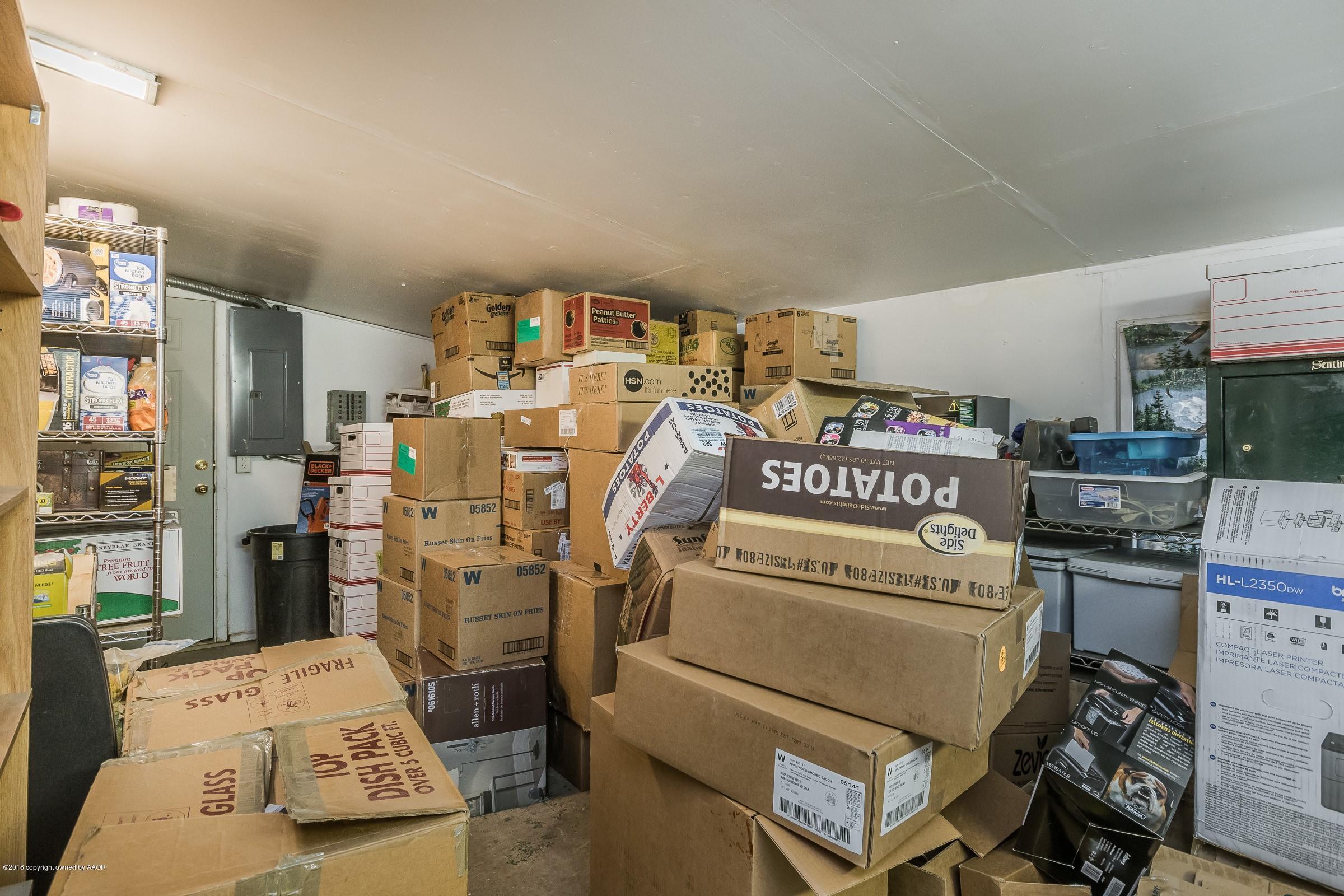 1201 Southwest 48th Avenue Amarillo, TX 79110 - Photo 15 of 18 a room with storage and utility