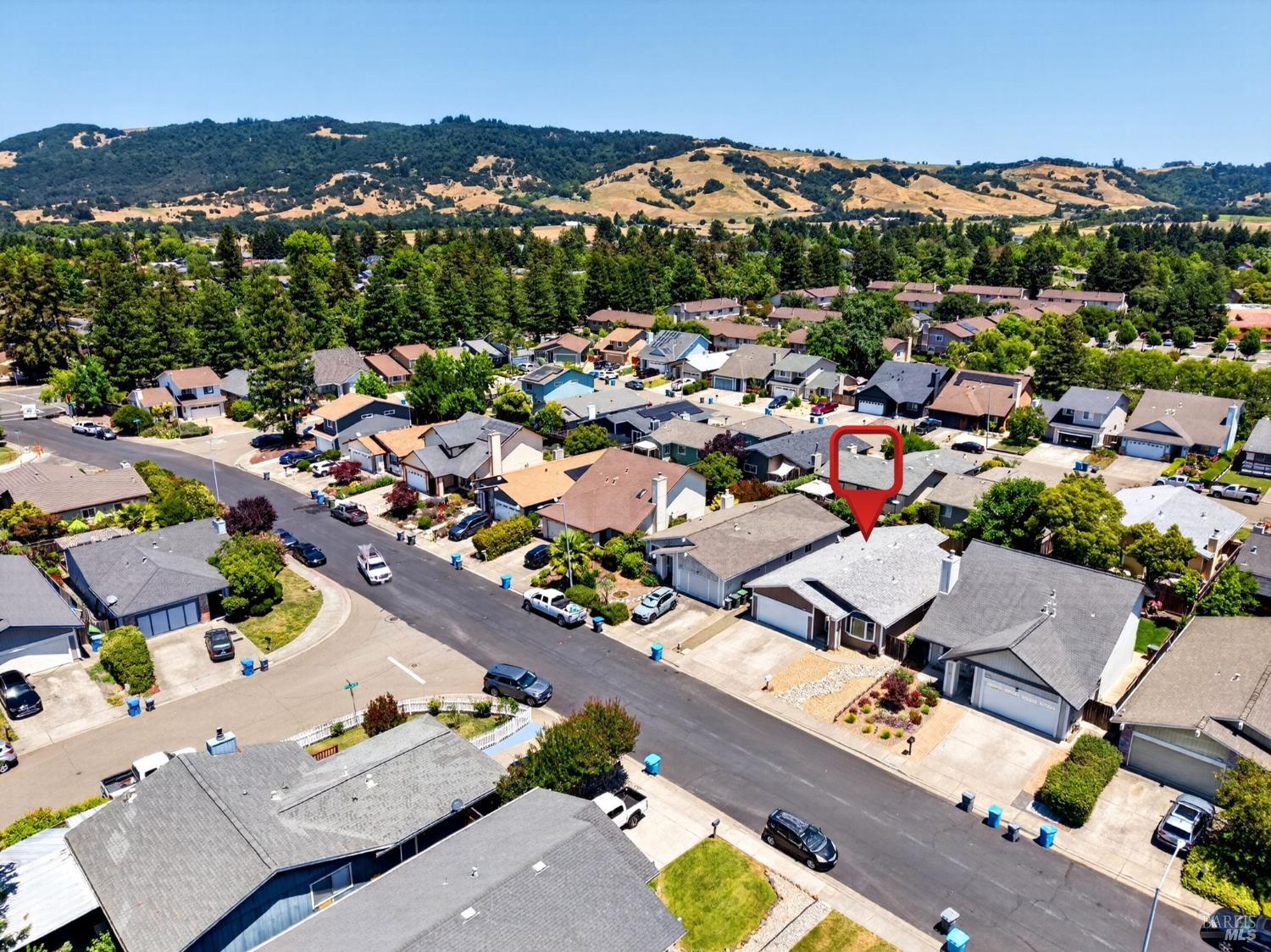 4526 Hillview Court Rohnert Park, CA 94928 - Photo 27 of 28 an aerial view of a city with lots of residential buildings and mountain view in back